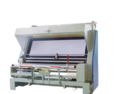 Cloth inspecting and winding machine
